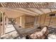 Relaxing shaded patio featuring a pergola and comfortable seating at 9305 Quail Ridge Dr, Las Vegas, NV 89134