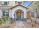 Charming home entrance with brick pathway and covered porch at 10650 Sariah Skye Ave, Las Vegas, NV 89166