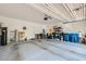 Spacious two-car garage with ample storage and epoxy flooring at 10650 Sariah Skye Ave, Las Vegas, NV 89166