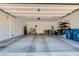 Large two-car garage with ample space for parking and storage at 10650 Sariah Skye Ave, Las Vegas, NV 89166