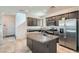 Well-equipped kitchen with stainless steel refrigerator and ample counter space at 10650 Sariah Skye Ave, Las Vegas, NV 89166