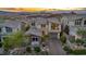 Scenic aerial view of a modern home with desert landscaping and mountain views at 19 Hilltop Crest St, Henderson, NV 89011