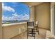 Relaxing balcony with views of the mountains and neighborhood, featuring comfortable seating at 19 Hilltop Crest St, Henderson, NV 89011