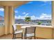 Cozy balcony featuring patio furniture and stunning views of mountains and the neighborhood at 19 Hilltop Crest St, Henderson, NV 89011