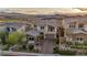 A shot of this beautiful house with desert landscaping and a two car garage at 19 Hilltop Crest St, Henderson, NV 89011