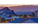Image of the exterior of the house with the Las Vegas cityscape in the background at 19 Hilltop Crest St, Henderson, NV 89011