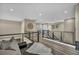 Hallway featuring contemporary design, recessed lighting and hardwood flooring leads to various rooms in the home at 19 Hilltop Crest St, Henderson, NV 89011
