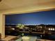 A scenic night view from the pool overlooking the city at 19 Hilltop Crest St, Henderson, NV 89011
