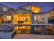 A back porch view of the home and pool, featuring wood furniture at 19 Hilltop Crest St, Henderson, NV 89011
