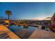 Watch the sunset from this homes beautiful backyard pool and spa at 19 Hilltop Crest St, Henderson, NV 89011