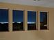 Picture shows the night view of the city from the windows in the house at 19 Hilltop Crest St, Henderson, NV 89011