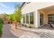 This backyard features landscaping, stone, and low-water plants for an eye-catching and practical space at 31 Autumn Palm Ave, Henderson, NV 89011
