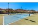Community tennis courts with mountain views at 31 Autumn Palm Ave, Henderson, NV 89011