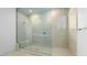 Stylish bathroom featuring a glass-enclosed shower with neutral tile and convenient bench seating at 352 Tigullio Ave, Henderson, NV 89011