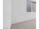 Spacious bedroom with carpeted flooring, white walls, a window and ample natural light at 352 Tigullio Ave, Henderson, NV 89011