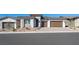 Attractive single-story home with a two-car garage and stone details on the facade at 352 Tigullio Ave, Henderson, NV 89011