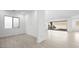 Spacious open-concept living area with tile flooring and lots of natural light at 352 Tigullio Ave, Henderson, NV 89011