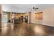 Open-concept kitchen featuring wood floors, a center island, and stainless steel appliances at 10437 Walworth Ave, Las Vegas, NV 89166