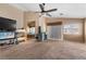 Cozy living room featuring a ceiling fan and neutral color scheme at 10437 Walworth Ave, Las Vegas, NV 89166