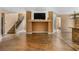 Open layout with a staircase, living area, and kitchen featuring modern finishes at 10437 Walworth Ave, Las Vegas, NV 89166
