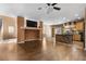 Inviting living area with wood flooring, kitchen view, and lots of natural light at 10437 Walworth Ave, Las Vegas, NV 89166