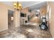 Spacious living room showcasing a fireplace, staircase, and an open floor plan at 10437 Walworth Ave, Las Vegas, NV 89166