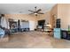 Spacious living room with ceiling fan and plenty of natural light at 10437 Walworth Ave, Las Vegas, NV 89166
