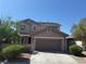 Charming two-story home featuring a two-car garage and well-maintained landscaping at 10793 Wallflower Ave, Las Vegas, NV 89135