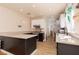 The kitchen features granite countertops, modern appliances, and ample cabinet space at 2691 Rimpacific Cir, Las Vegas, NV 89146
