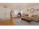 Bright living room with hardwood floors, neutral decor and natural light at 2691 Rimpacific Cir, Las Vegas, NV 89146