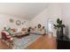 Spacious living room showcasing hardwood floors, vaulted ceiling and open floor plan at 2691 Rimpacific Cir, Las Vegas, NV 89146