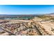 An aerial view of a charming community with views of the adjacent river and surrounding mountains at 3665 Cottage Stone Ct, Laughlin, NV 89029