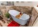 Bathroom with tiled shower, soaking tub, and modern finishes at 3665 Cottage Stone Ct, Laughlin, NV 89029