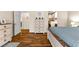 Primary bedroom with hardwood flooring and ensuite bathroom at 3665 Cottage Stone Ct, Laughlin, NV 89029
