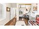 Spacious bedroom includes a seating area, natural light, and wood-look floors at 3665 Cottage Stone Ct, Laughlin, NV 89029