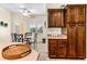 Eat-in dining area adjacent to kitchen features a breakfast nook and dark wood cabinetry at 3665 Cottage Stone Ct, Laughlin, NV 89029