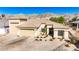Charming single-story home featuring a three-car garage and low maintenance landscaping at 3665 Cottage Stone Ct, Laughlin, NV 89029
