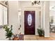 The foyer has tile flooring and a glass-paneled front door with sidelights offering natural light at 3665 Cottage Stone Ct, Laughlin, NV 89029