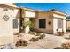 A welcoming front yard with a walkway leading to the front door surrounded by desert landscaping at 3665 Cottage Stone Ct, Laughlin, NV 89029