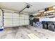 Spacious two car garage with ample storage space along the walls at 3665 Cottage Stone Ct, Laughlin, NV 89029