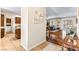 Open floor plan featuring wood flooring, kitchen, dining and living spaces with a neutral color palette at 3665 Cottage Stone Ct, Laughlin, NV 89029