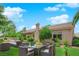 Staged backyard with outdoor seating area, perfect for enjoying the beautifully landscaped surroundings at 4722 Blue Mesa Way, Las Vegas, NV 89129
