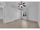Bedroom showcasing light wood floors, closet, and a window at 4722 Blue Mesa Way, Las Vegas, NV 89129