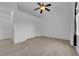 Bedroom featuring neutral walls, flooring, a ceiling fan and closet at 4722 Blue Mesa Way, Las Vegas, NV 89129