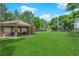 Community park with a covered picnic area, seating, and ample space for outdoor activities and gatherings at 4722 Blue Mesa Way, Las Vegas, NV 89129