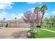 Attractive single-story home with well-maintained lawn, beautiful landscaping, and a three-car garage at 4722 Blue Mesa Way, Las Vegas, NV 89129