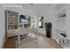 Bright and modern home office featuring stylish built-in shelving and a comfortable workspace at 4722 Blue Mesa Way, Las Vegas, NV 89129
