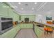 Well-appointed kitchen featuring custom cabinets, modern appliances, and granite countertops at 4722 Blue Mesa Way, Las Vegas, NV 89129
