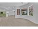 Spacious living area showcasing hardwood floors, lots of natural light, and an open floor plan at 4722 Blue Mesa Way, Las Vegas, NV 89129