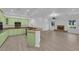 Open concept living area adjacent to the kitchen with tile fireplace at 4722 Blue Mesa Way, Las Vegas, NV 89129